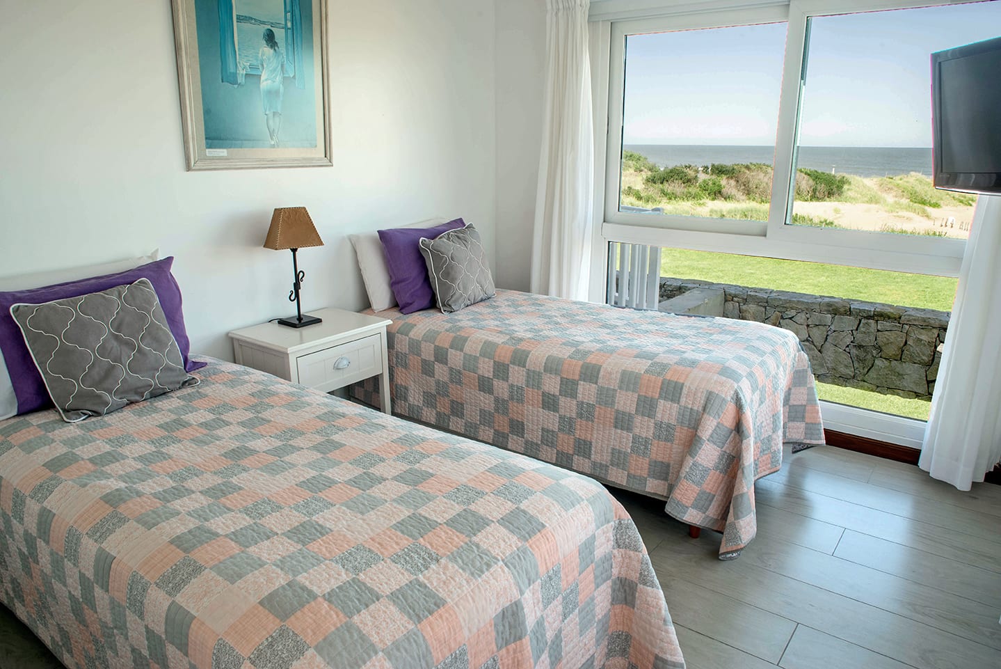 Dormitorio con dos camas, unidad 1.